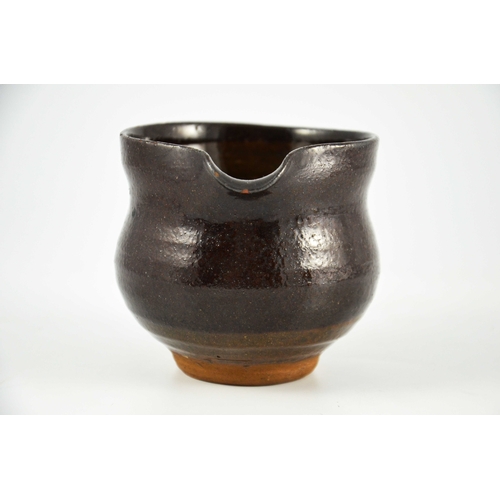 1428 - Margaret Leach for Wye Valley, a studio pottery jug, brown treacle glaze, impressed mark, 9cm high