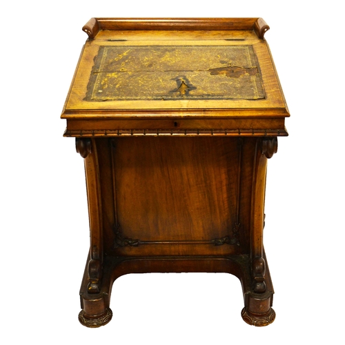 227 - A Davenport walnut desk, 19th century, 74cm high