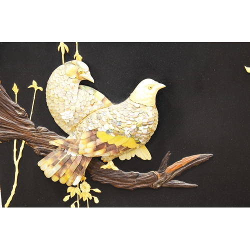 440 - A 19th century Japanese Shibayama panel, modelled with two doves on a branch with blossom above, in ... 