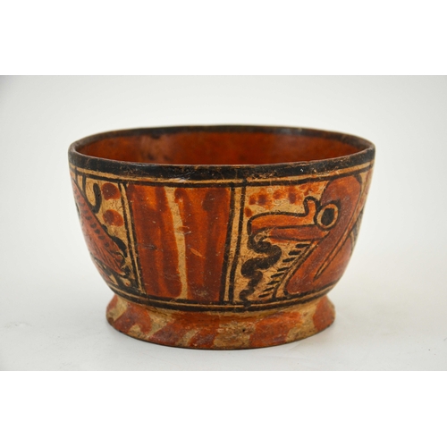 539 - A pre-Columbian earthenware bowl, footed form, painted with wild animals, 16.5cm wide