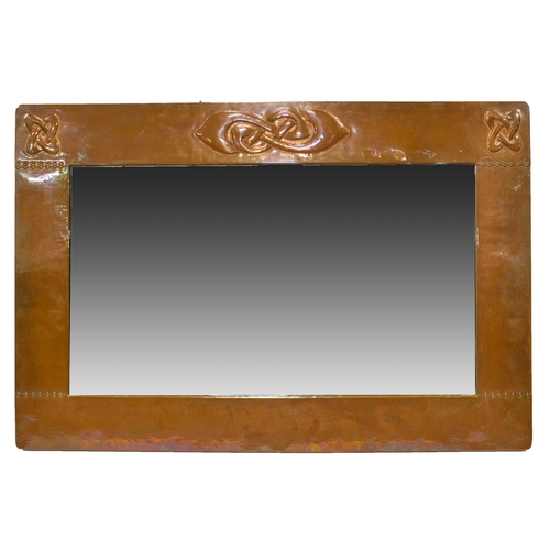 582 - Archibald Knox for Liberty and Co., an Arts and Crafts copper mirror, rectangular, repousse decorate... 