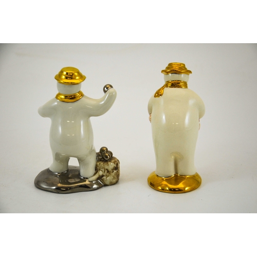 894 - Two Royal Doulton snowmen figures, Thankyou and Snowballing, gold and silver highlights colourway, p... 