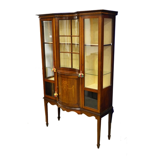 226 - A Edwardian mahogany and satin wood inlaid display cabinet, the central concave glazed panel above a... 