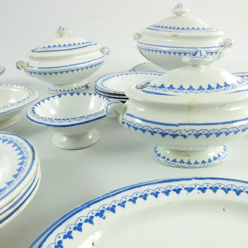 1521 - A Copeland miniature creamware dinner set, including tureens, plates, bowls etc., in the Gothic Revi... 