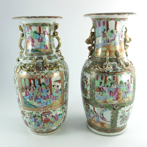 401 - A large matched pair of Chinese famille rose vases, 19th century or earlier, shouldered form with re... 