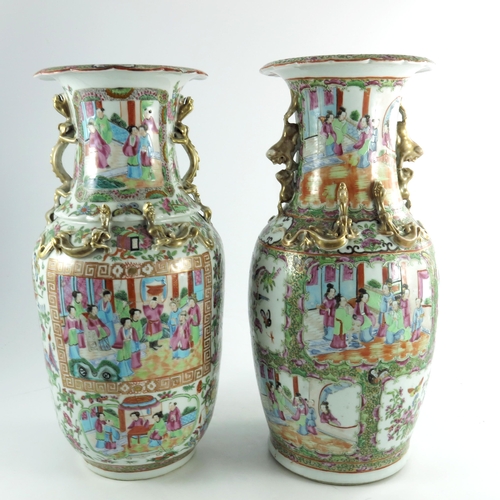 401 - A large matched pair of Chinese famille rose vases, 19th century or earlier, shouldered form with re... 