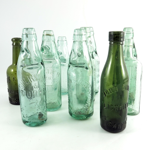 776 - A quantity of old Staffordshire bottles, to include spirit flask by W. Roberts of Brownhills, Willia... 