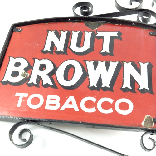 801 - A double sided enamel sign for NUT BROWN TOBACCO, within an iron frame, sign 46cm x 34.5cm, frame 81... 