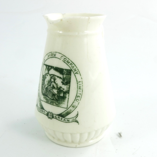 806 - A belleek cream jug with transfer in green from THE BELGRAVIA DAIRY COMPANY LIMITED, together with p... 