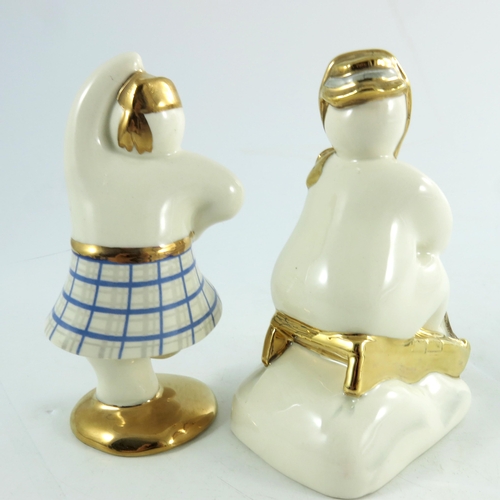 891 - Two Royal Doulton snowmen figures, Highland and Toboggan, gold and silver highlights colourway, prop... 