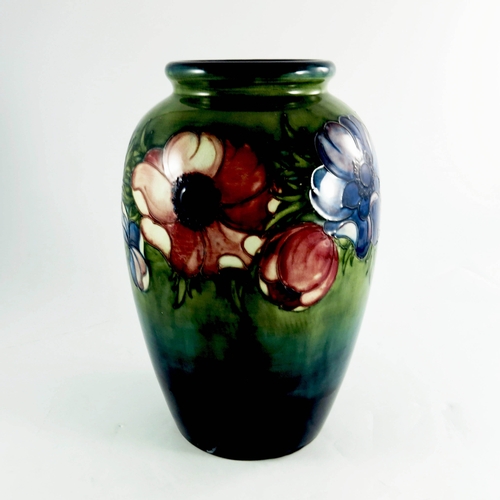 1083 - Walter Moorcroft, a large Anemone on green vase, 1953, shouldered ovoid form, impressed marks and fa... 