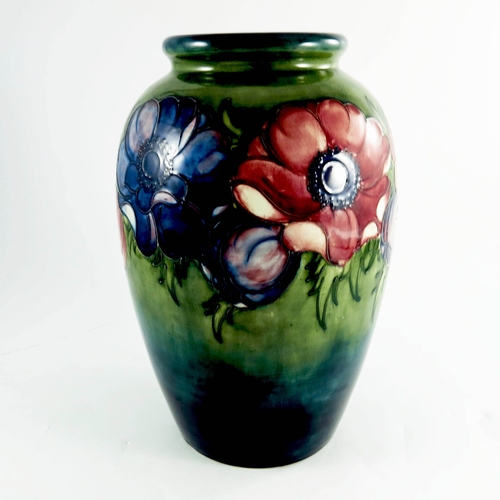 1083 - Walter Moorcroft, a large Anemone on green vase, 1953, shouldered ovoid form, impressed marks and fa... 