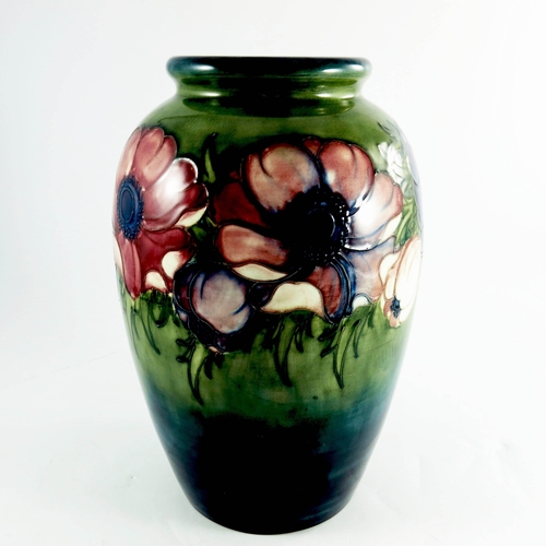 1083 - Walter Moorcroft, a large Anemone on green vase, 1953, shouldered ovoid form, impressed marks and fa... 