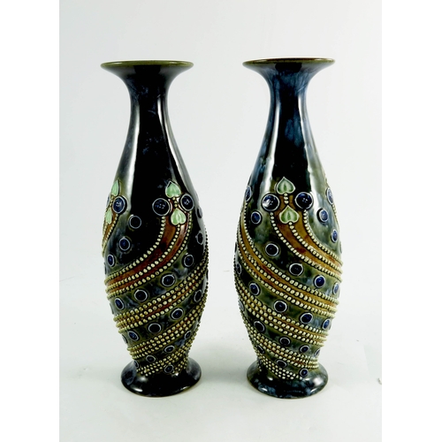 1232 - A pair of Royal Doulton stoneware vases, elongated ovoid form with flared neck, relief moulded bead ... 