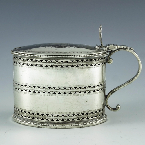 2010 - William Abdy, London 1786, a George III silver mustard pot, straight sided oval form, reticulated an... 