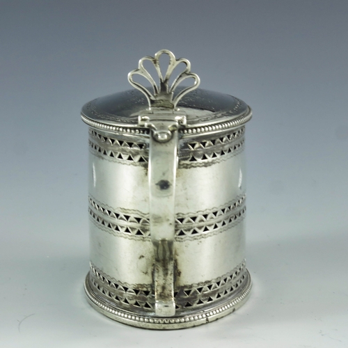 2010 - William Abdy, London 1786, a George III silver mustard pot, straight sided oval form, reticulated an... 