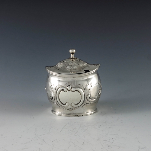 2011 - John Gold, London 1801, a George III silver mustard pot of navette form, the body with moulded and c... 