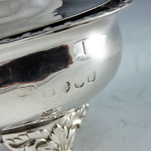 2013 - Thomas Dicks, London 1818, a George III silver oval mustard pot raised on shell scroll feet, gadroon... 