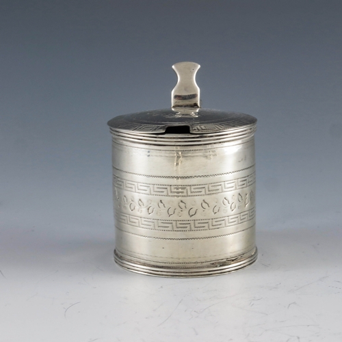 2022 - Alexander Field, London 1807, a George III silver mustard pot, of cylindrical form, chased with a fo... 