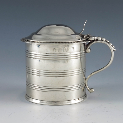 2023 - Edward Crofton, Dublin 1815, a George III Irish silver mustard pot, cylindrical form, etched with co... 