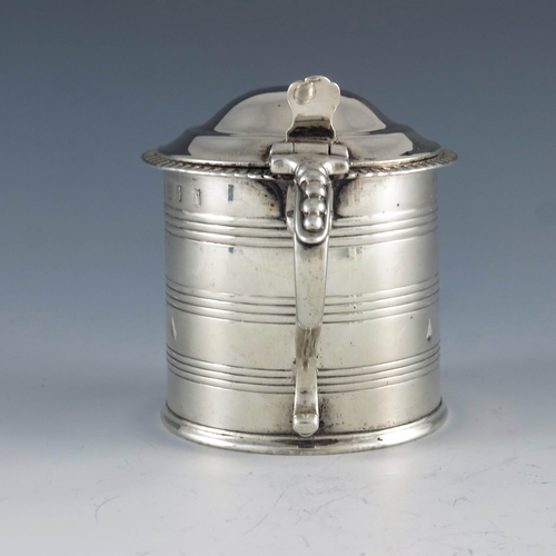 2023 - Edward Crofton, Dublin 1815, a George III Irish silver mustard pot, cylindrical form, etched with co... 