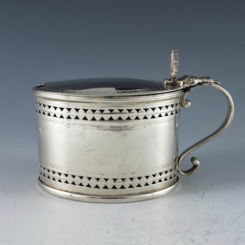 2029 - William Abdy I, London 1787, a George III silver mustard pot, straight sided oval form, reticulated ... 