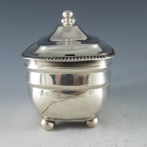 2030 - Solomon Hougham, London 1809, a George III silver mustard pot of rectangular moulded oval form, rais... 