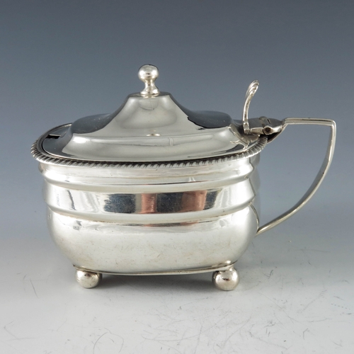 2030 - Solomon Hougham, London 1809, a George III silver mustard pot of rectangular moulded oval form, rais... 