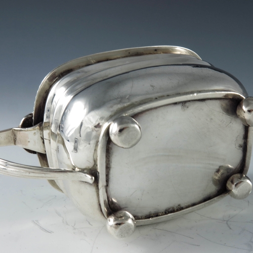 2030 - Solomon Hougham, London 1809, a George III silver mustard pot of rectangular moulded oval form, rais... 