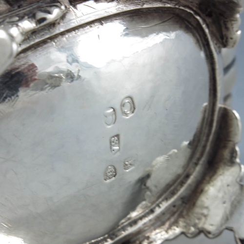 2032 - Stephen Adams, London 1818, a George III silver mustard pot, half reeded rectagular baluster form on... 