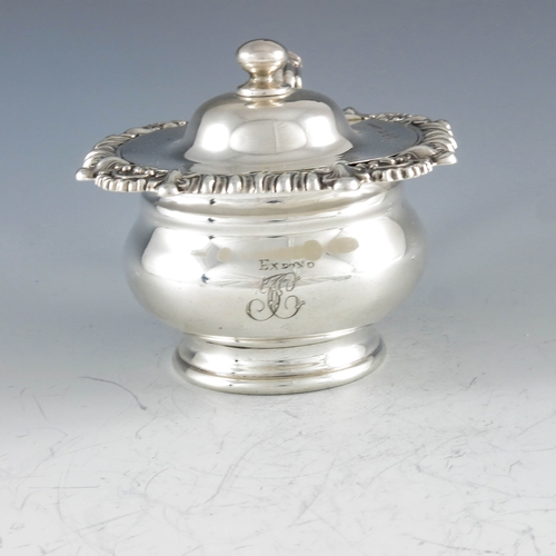 2033 - J Fenton, Sheffield 1820, a George III silver mustard pot, footed ogee moulded baluster form with wi... 