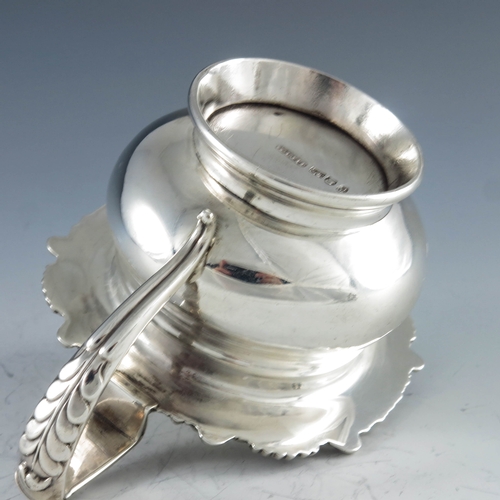 2033 - J Fenton, Sheffield 1820, a George III silver mustard pot, footed ogee moulded baluster form with wi... 