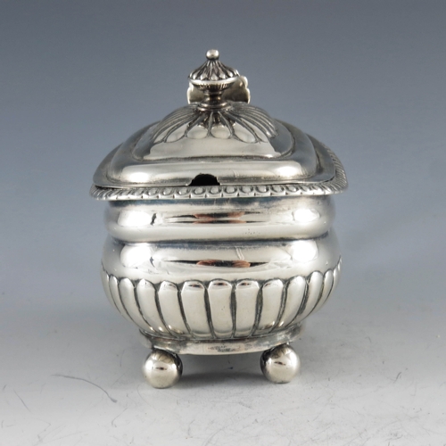 2034 - Rebecca Emes and Edward Barnard, London 1814, a George III silver mustard pot of oval part fluted fo... 