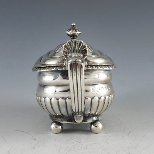 2034 - Rebecca Emes and Edward Barnard, London 1814, a George III silver mustard pot of oval part fluted fo... 