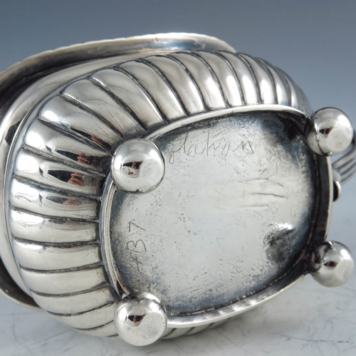 2034 - Rebecca Emes and Edward Barnard, London 1814, a George III silver mustard pot of oval part fluted fo... 