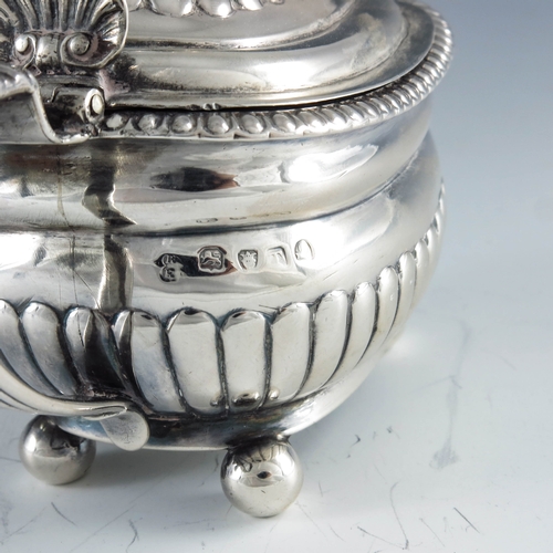 2034 - Rebecca Emes and Edward Barnard, London 1814, a George III silver mustard pot of oval part fluted fo... 