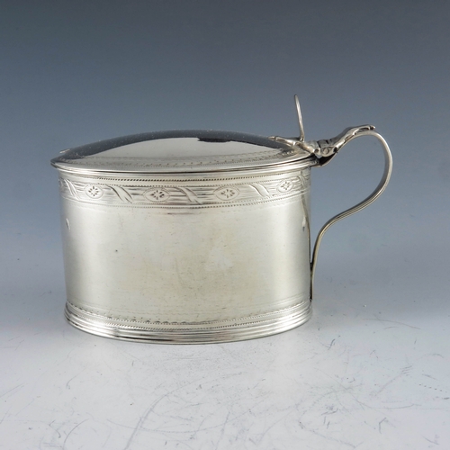 2037 - Robert Hennell, London 1791, a George III silver mustard pot, straight sided oval form, bright cut r... 