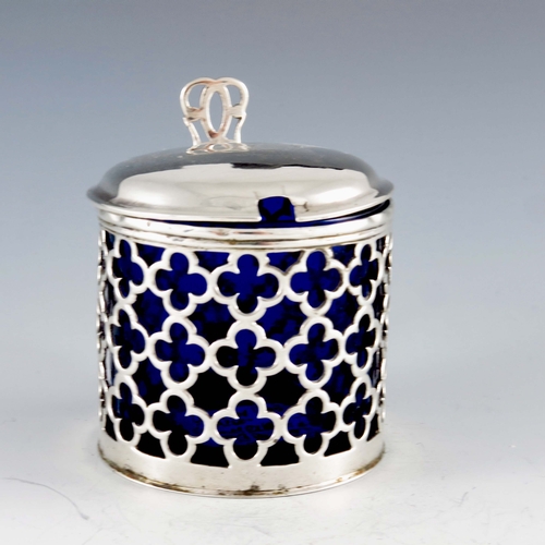 2041 - Charles Chesterman, London 1768, a George III silver mustard pot, reticulated cylindrical form, quat... 