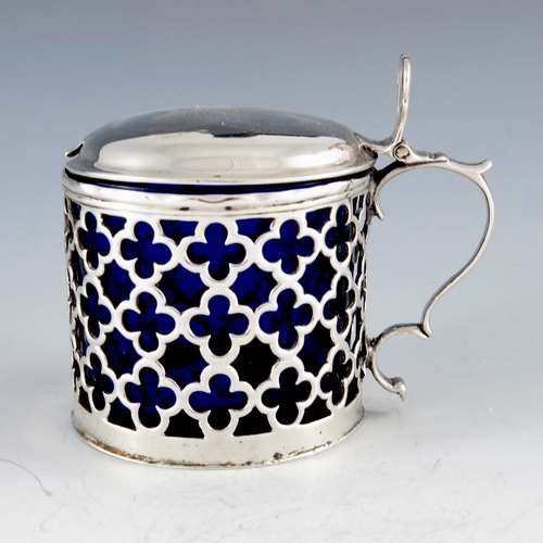 2041 - Charles Chesterman, London 1768, a George III silver mustard pot, reticulated cylindrical form, quat... 