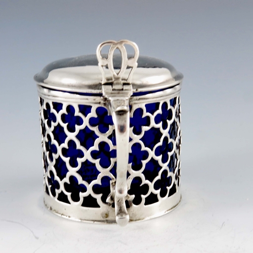 2041 - Charles Chesterman, London 1768, a George III silver mustard pot, reticulated cylindrical form, quat... 