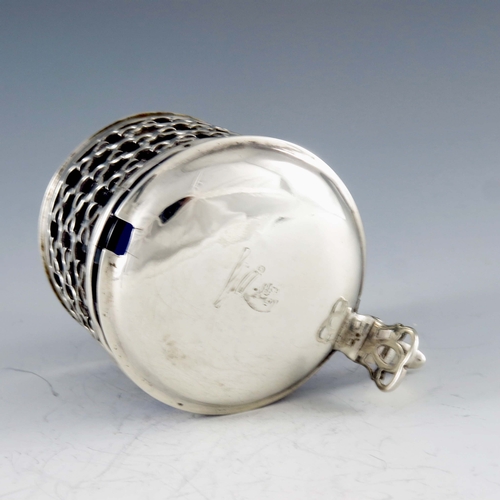 2041 - Charles Chesterman, London 1768, a George III silver mustard pot, reticulated cylindrical form, quat... 