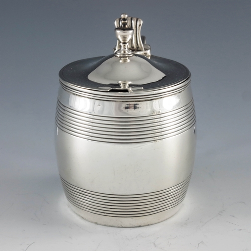 2043 - Stephen Adams, London 1805, a George III silver mustard pot of barrel form with reeded decoration, a... 