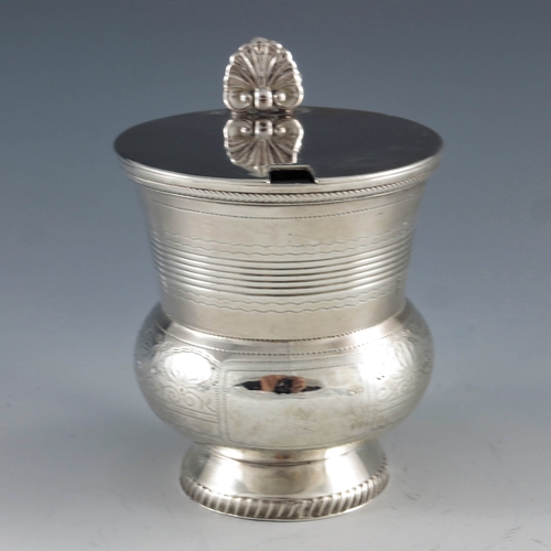 2044 - Naphtali Hart, London 1816, a George III silver mustard pot, footed bulbous beaker form with conical... 