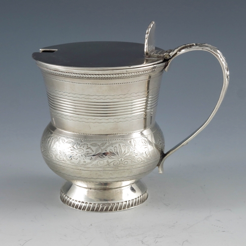 2044 - Naphtali Hart, London 1816, a George III silver mustard pot, footed bulbous beaker form with conical... 