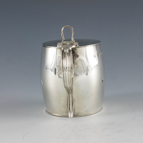 2045 - William Sumner I, London 1804, a George III silver mustard pot of plain barrel form with hinged lid,... 