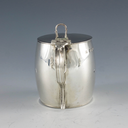 2045 - William Sumner I, London 1804, a George III silver mustard pot of plain barrel form with hinged lid,... 