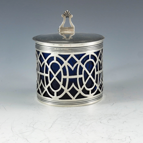 2047 - Samuel Herbert and Co., London 1764, a George III silver mustard pot, reticulated cylindrical form w... 