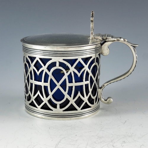 2047 - Samuel Herbert and Co., London 1764, a George III silver mustard pot, reticulated cylindrical form w... 