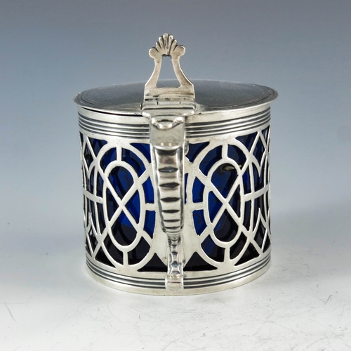 2047 - Samuel Herbert and Co., London 1764, a George III silver mustard pot, reticulated cylindrical form w... 