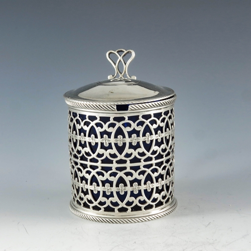 2048 - Thomas Nash, London 1773, a George III silver mustard pot, reticulated cylindrical form, two rows of... 